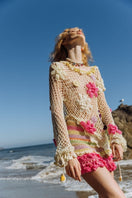 Multicolor handmade crochet top by Andreeva featuring intricate knit details and a fitted style, perfect for casual wear.