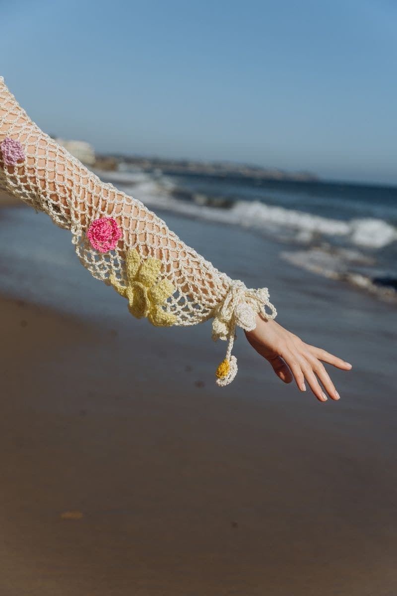 Multicolor handmade crochet top by Andreeva, featuring intricate crochet patterns and a stylish, fitted design.