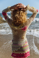 Multicolor handmade crochet top by Andreeva featuring intricate patterns and a relaxed fit, displayed on a neutral background.