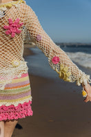 Multicolor handmade crochet top by Andreeva featuring intricate crochet patterns and a relaxed fit.