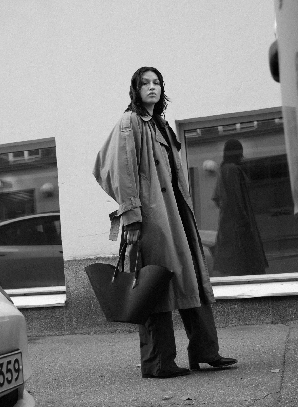 Black ASK Scandinavia Willow shoulder handbag with sleek design and shoulder strap, stylish for everyday use.