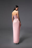 Pink CULT MIA X HAPPY CLOTHING pegged sleeveless taffeta gown displayed on a hanger with a flowing design and elegant silhouette.
