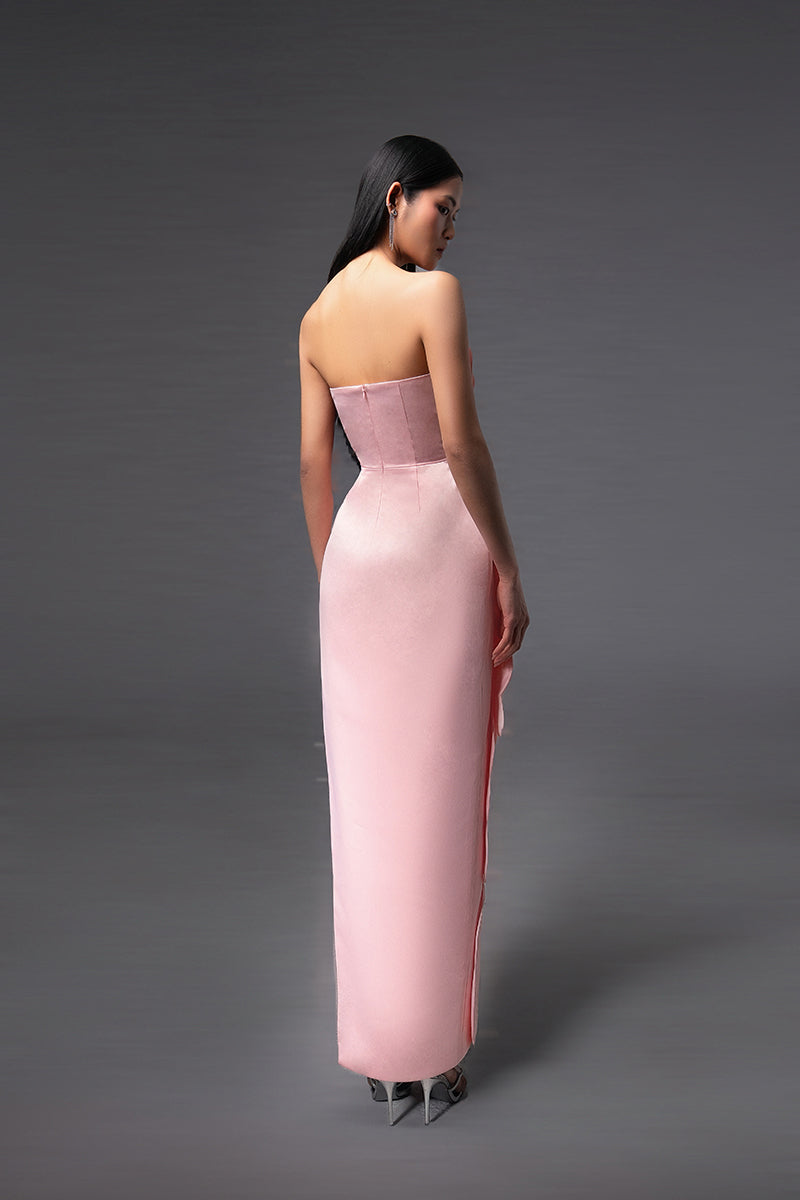 Pink CULT MIA X HAPPY CLOTHING pegged sleeveless taffeta gown displayed on a hanger with a flowing design and elegant silhouette.