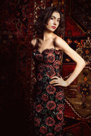 Nana Gotti rose corduroy gown with long sleeves and fitted waist, showcasing soft fabric and elegant design.