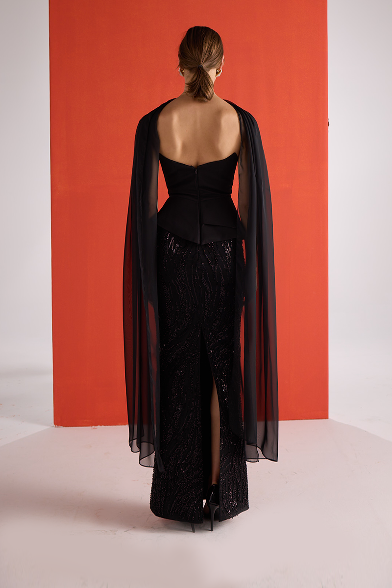 Black embroidered corset co-ord set by Joanna Andraos, showing the back view with detailed embroidery and fitted design.