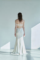 JINSUN Botanic embellished ivory cupro gown shown from the back with intricate floral embroidery and flowing fabric.