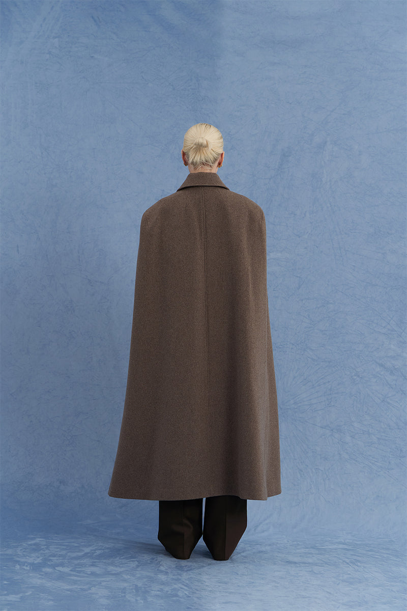 Back view of JINSUN long brown wool cape coat showcasing its elegant drape and classic design.