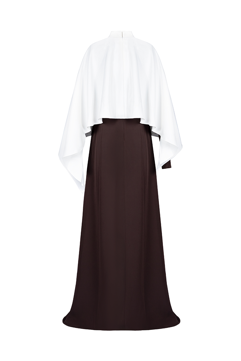 Joanna Andraos ivory evening gown with a flowing cape, back view, elegant design perfect for formal occasions.