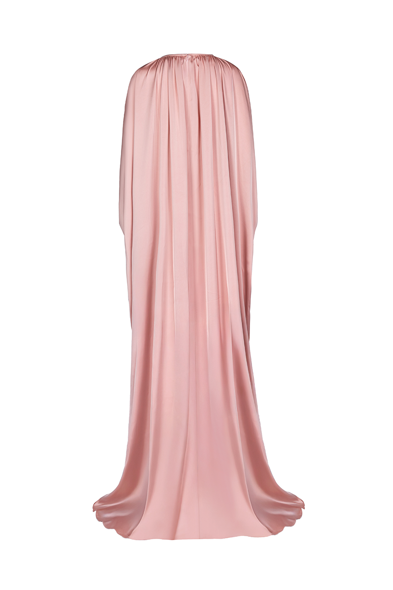 Back view of Joanna Andraos Cult Mia X Joanna Andraos soft nude silk gown showcasing elegant draping and flowing fabric.