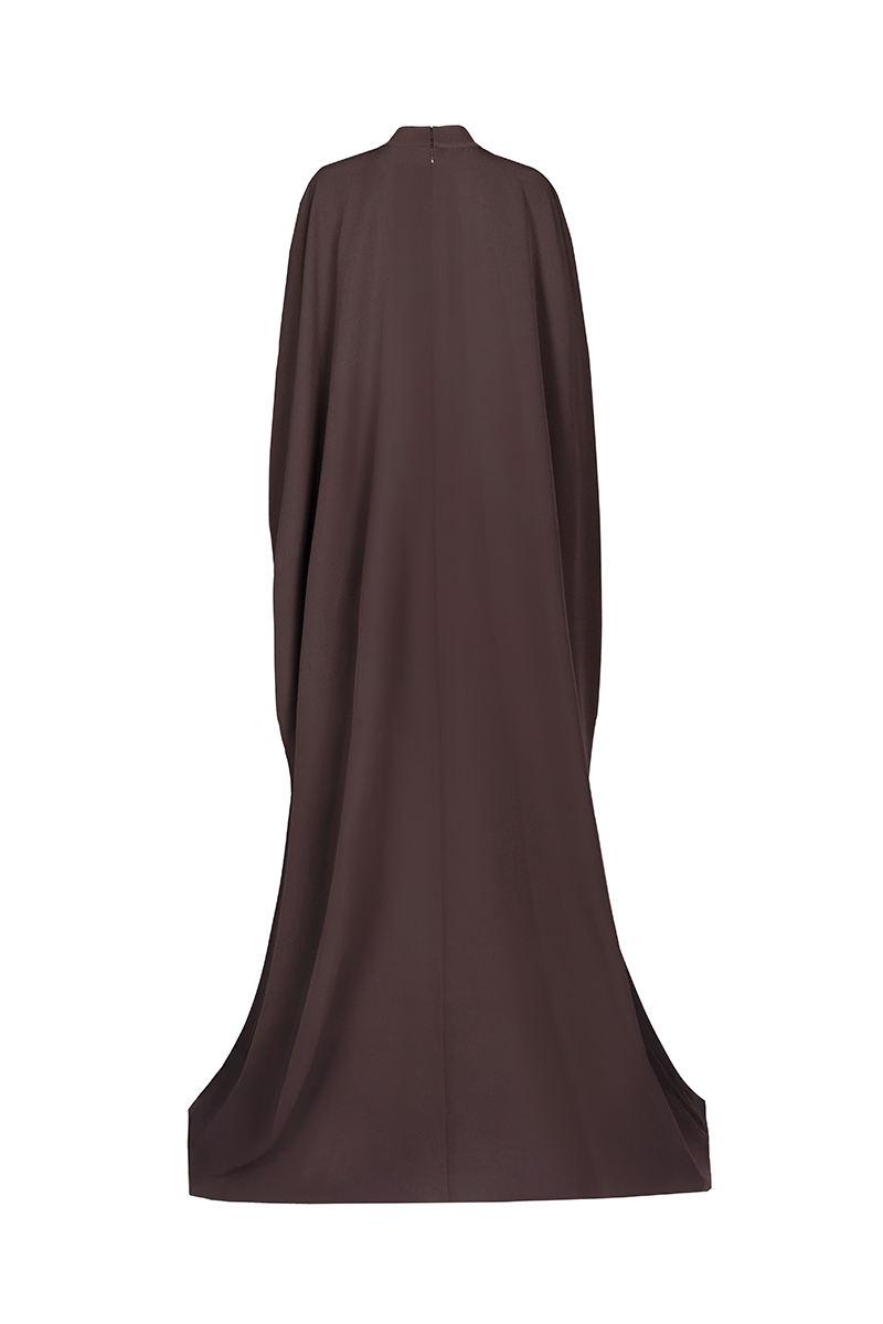 Joanna Andraos Cult Mia X gown with corset bodice and detachable cape, shown from the back in a stylish dress image.