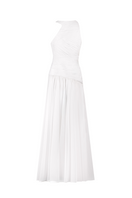 White asymmetrical low waistline gown by Joanna Andraos, showing the back design with flowing fabric and elegant silhouette.