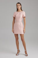 Pink LARA fondant mini dress with diamond belt by BAÉ, featuring a fitted silhouette and elegant design.