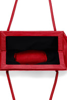 Red Elizabeth Baguette Mini Pebble shoulder bag by behno New York, showing its compact design with textured pebble leather.