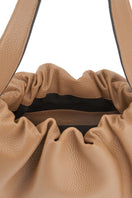 Large almond-colored pebble leather shoulder bag from behno New York's ANA TOTE collection, featuring detailed craftsmanship.