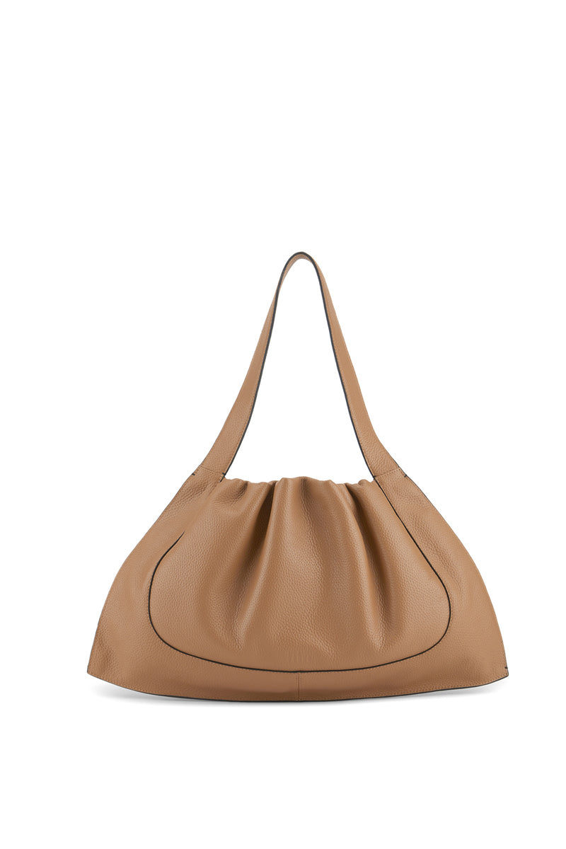 Large almond-colored pebble leather shoulder bag by behno New York, featuring a sleek design and structured silhouette.