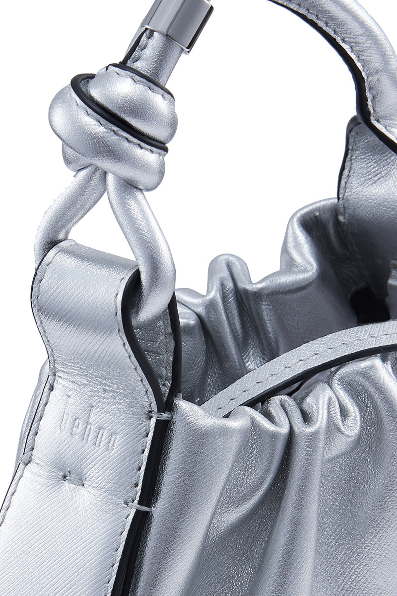 Silver metallic Baguette Mini Top Handle Bag with ruched saffiano texture by behno New York.