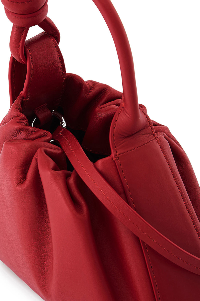 Red Behno New York Tina Baguette Mini Nappa ruched top handle bag with elegant design and compact size.