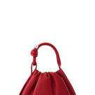 Red Tina Baguette Mini Nappa ruched top handle bag by behno New York, front view showing elegant design and compact size.