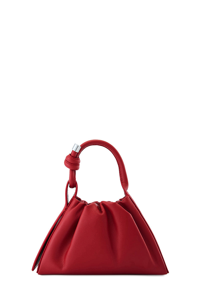 Red Tina Baguette Mini Nappa ruched top handle bag by behno New York, front view showing elegant design and compact size.