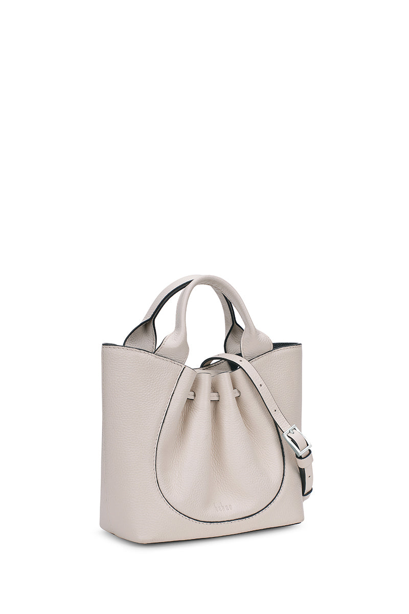 Behn0 New York Katrina Mini Tote in Pebble Pumice, shoulder bag with structured design and top handle, view from three-quarter angle.