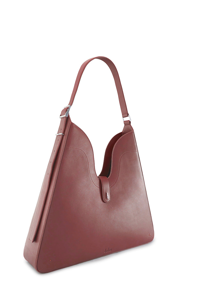 Behno New York Melina shoulder bag in nappa brick leather, featuring a stylish and compact design with a shoulder strap.