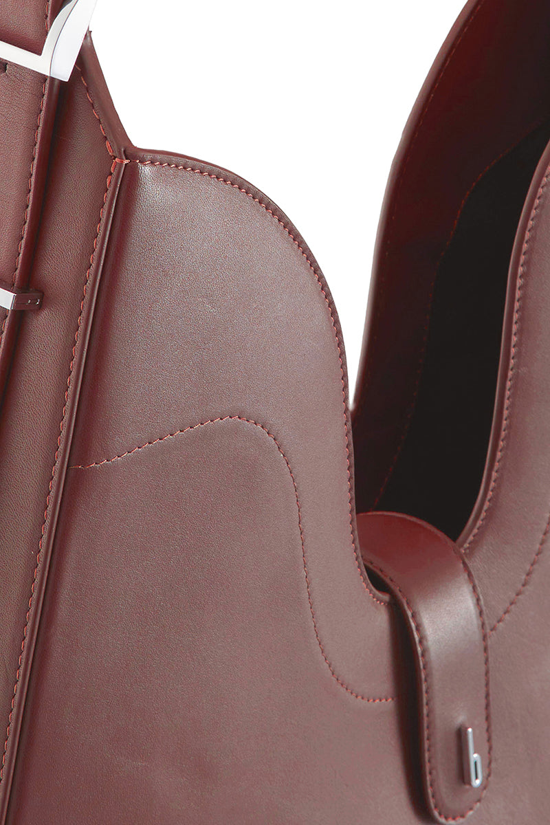 Behno New York Melina shoulder bag in nappa leather with a brick color, featuring sleek design and shoulder strap.