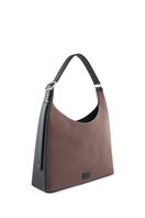 Large canvas shoulder bag by behno New York in cacao and black with a sleek, structured design and top handle detail.