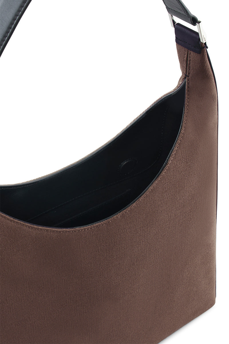 Large canvas Danny Flatiron Bag in Cacao and Black by behno New York, shown with detailed close-up of textured fabric and shoulder strap.