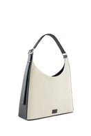 Large canvas shoulder bag by behno New York in sand and black, featuring a sleek, structured design with a top handle and shoulder strap.
