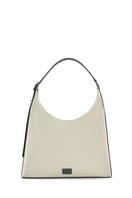 Large canvas shoulder bag by behno New York in sand and black, featuring a sleek front view and spacious design.
