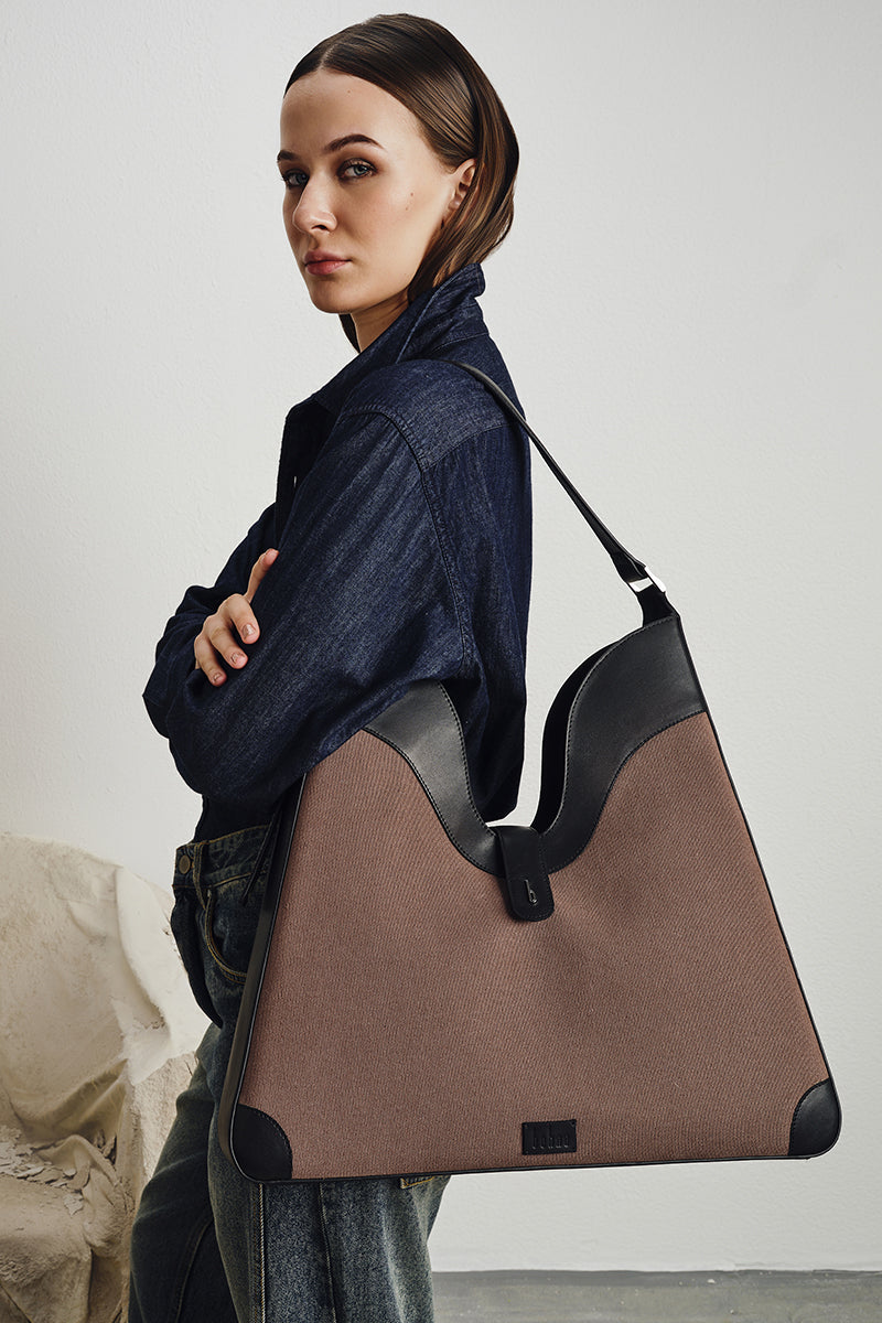 Behno New York Melina shoulder bag in canvas with cacao and black color, featuring a stylish, structured design and shoulder strap.