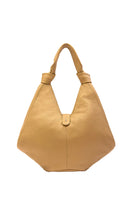 Large Nelli Hobo shoulder bag in pebble bisque leather by behno New York, showing its spacious design and textured surface.