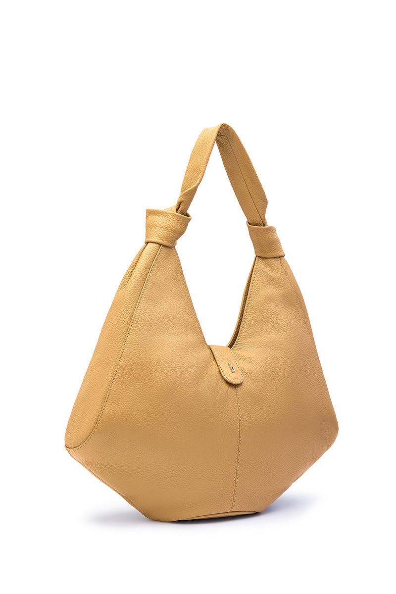 Large NELLI Hobo shoulder bag in pebble bisque leather by behno New York, showing its soft textured surface and spacious design.