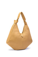 Large Nelli Hobo shoulder bag in pebble bisque leather by behno New York, featuring a spacious, textured design and natural pebble finish.