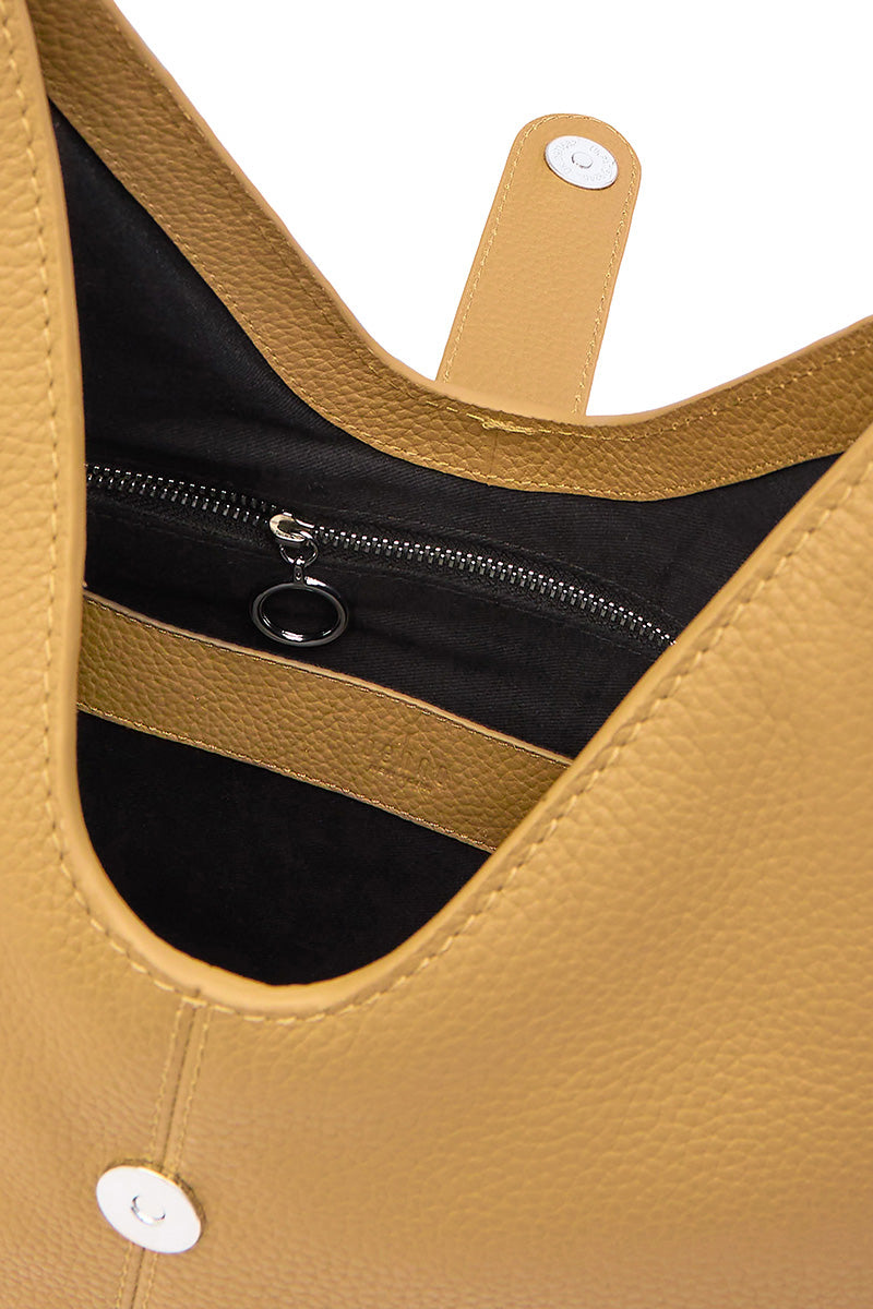 Large Nelli Hobo shoulder bag in Pebble Bisque leather from behno New York, featuring a slouchy, textured design.