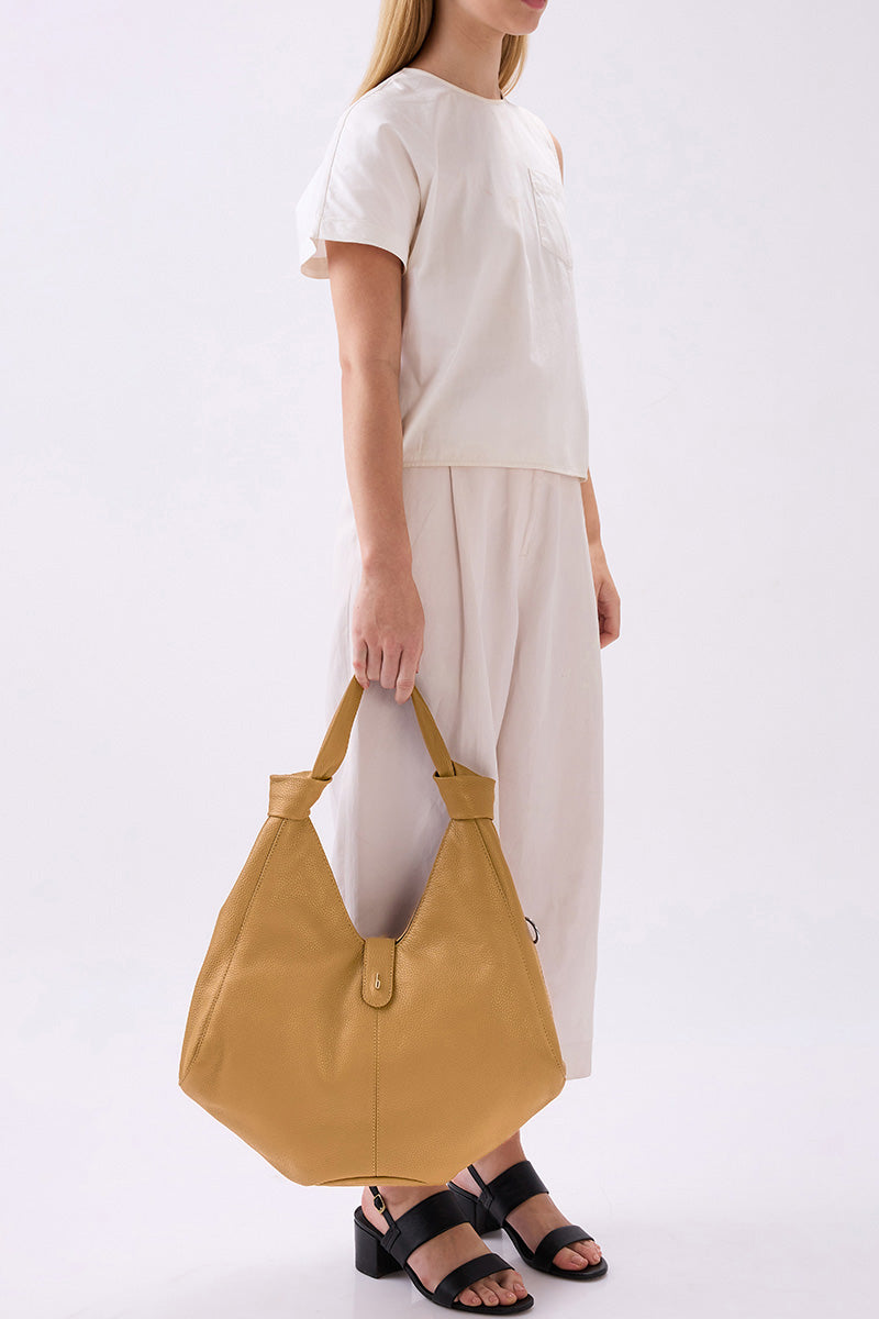 Large NELLI Hobo shoulder bag in Pebble Bisque leather by behno New York, featuring a spacious design and soft textured finish.