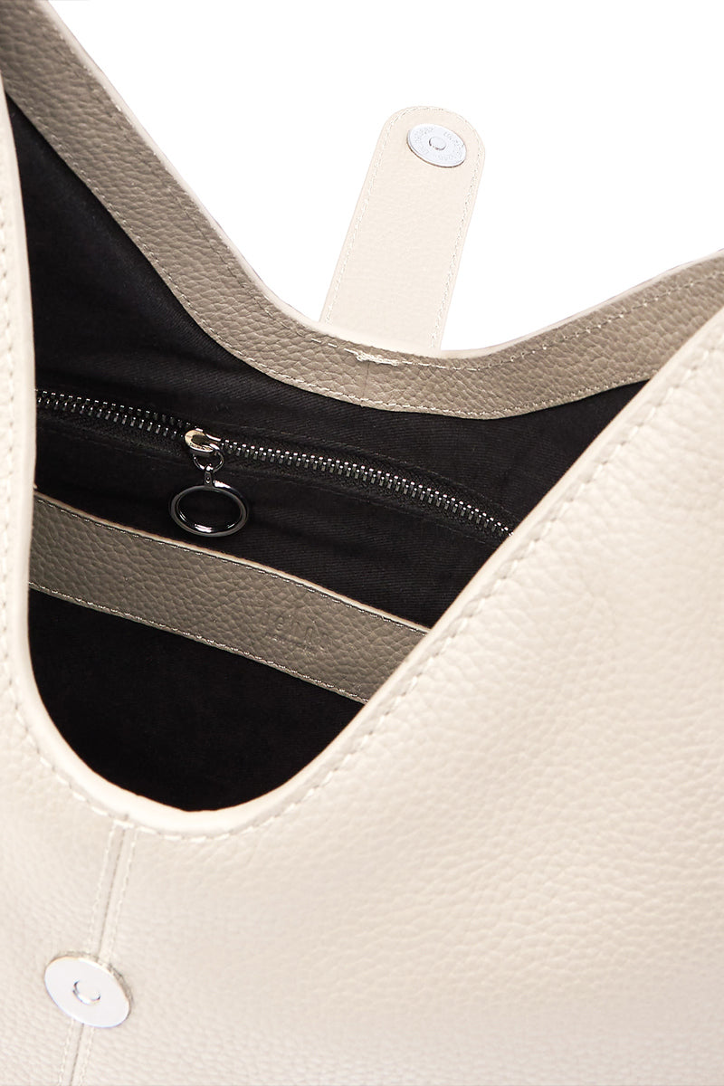 Interior view of the behno New York Nelli Hobo Large Pebble Shoulder Bag in Bone, showing spacious interior and high-quality craftsmanship.