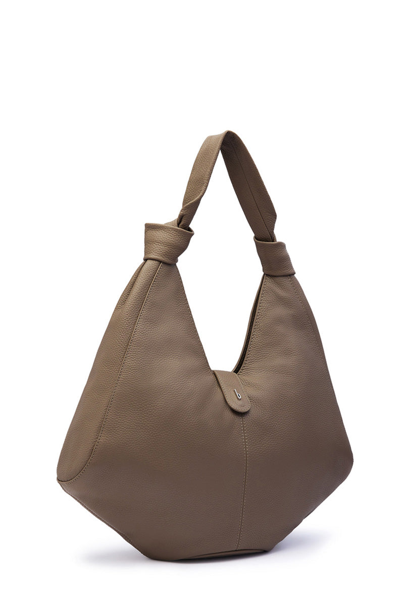 Large taupe pebble leather NELLI HOBO shoulder bag by behno New York, showing its soft textured leather and spacious design.