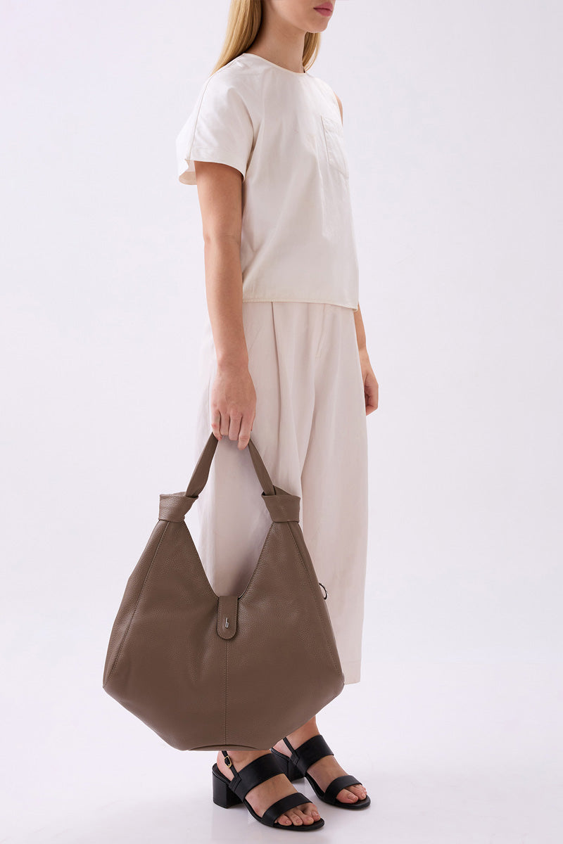 Large taupe NELLI Hobo shoulder bag by behno New York, featuring pebble textured leather and a spacious, stylish design.