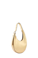 Medium metallic gold INA Crescent Bag shoulder bag by behno New York, featuring a sleek, curved design with a smooth finish.