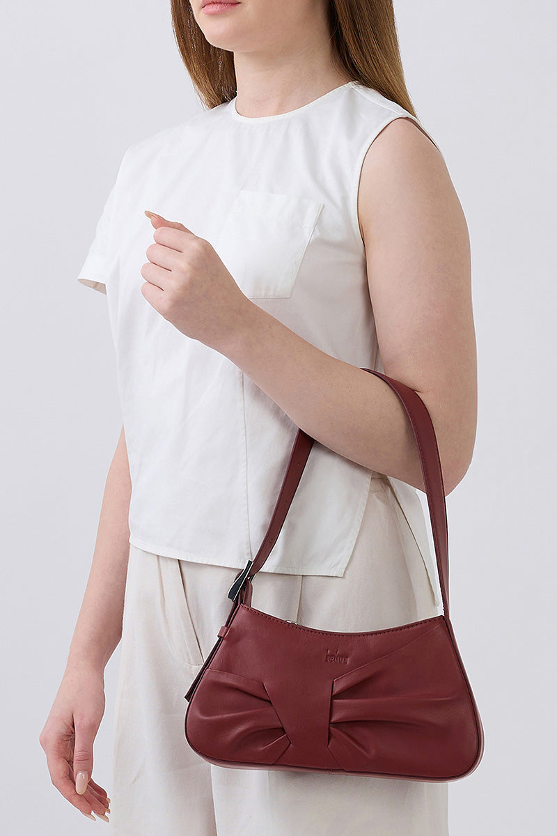 Behn0 New York Leena Mini Shoulder Bag in brick-colored nappa leather with draped design and compact size.
