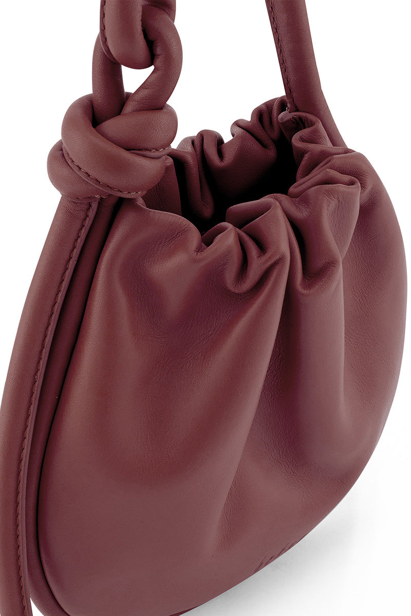 Behnо New York INA Mini Potli Nappa Brick top handle bag with elegant design and structured shape.
