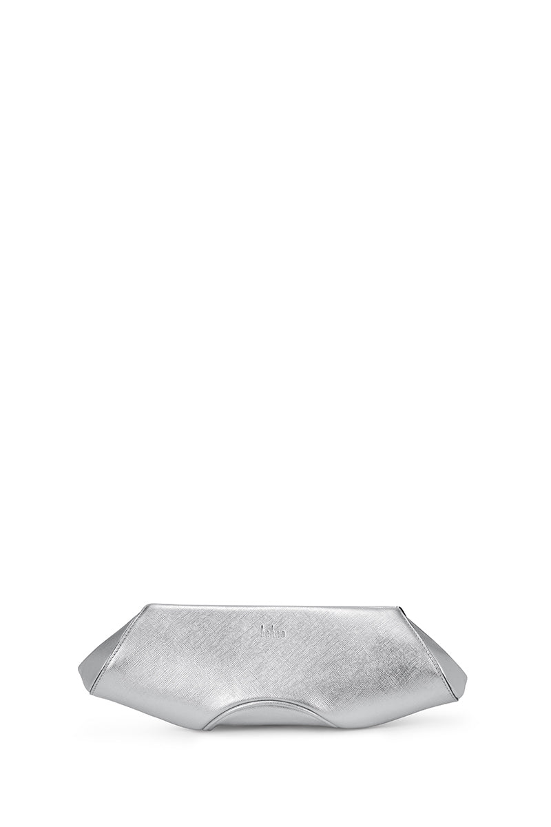 Silver Elizabeth Baguette mini clutch by behno New York, featuring a sleek, rectangular design with a textured surface and wrist strap.