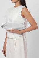 Silver Elizabeth Baguette mini clutch bag by behno New York, featuring a sleek, compact design and metallic finish.