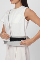 Silver Elizabeth Baguette mini clutch by behno New York, showcasing sleek metallic design and compact style.