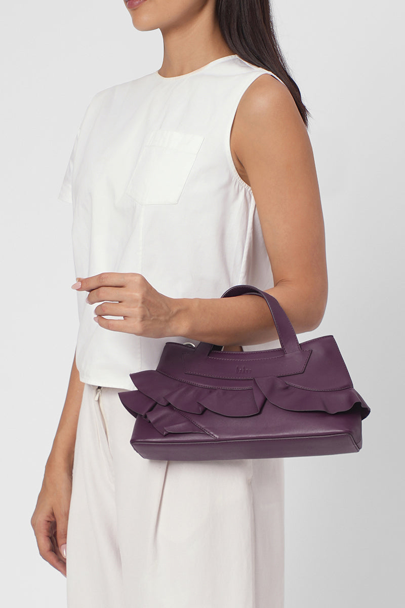 Behn0 New York Franca Bag Ruffle Nappa Cherry top handle bag with ruffled design and smooth leather finish.