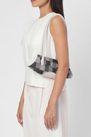 Behnon New York Elizabeth Baguette Mini top handle bag in Pumice with Kantha silk and pebble detailing, worn on shoulder.