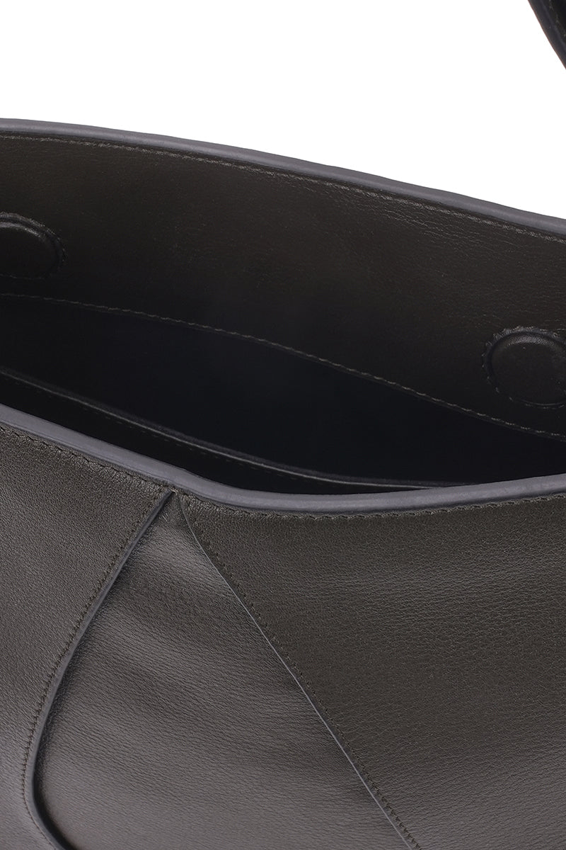 Close-up of behno New York Nilde Hobo shoulder bag in milled cacao leather, showing detailed texture and stitching.