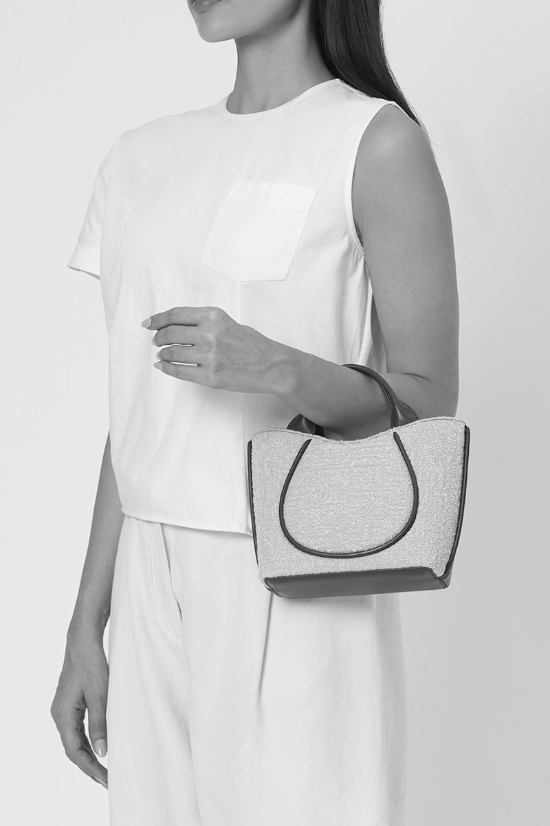 Behn New York Katrina Mini Tote No2 in boucle wool and nappa leather, in pumice and black, shoulder bag with sleek design.