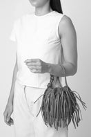 Silver INA Mini Potli fringe crinkle top handle bag by behno New York with decorative fringe details and elegant design.